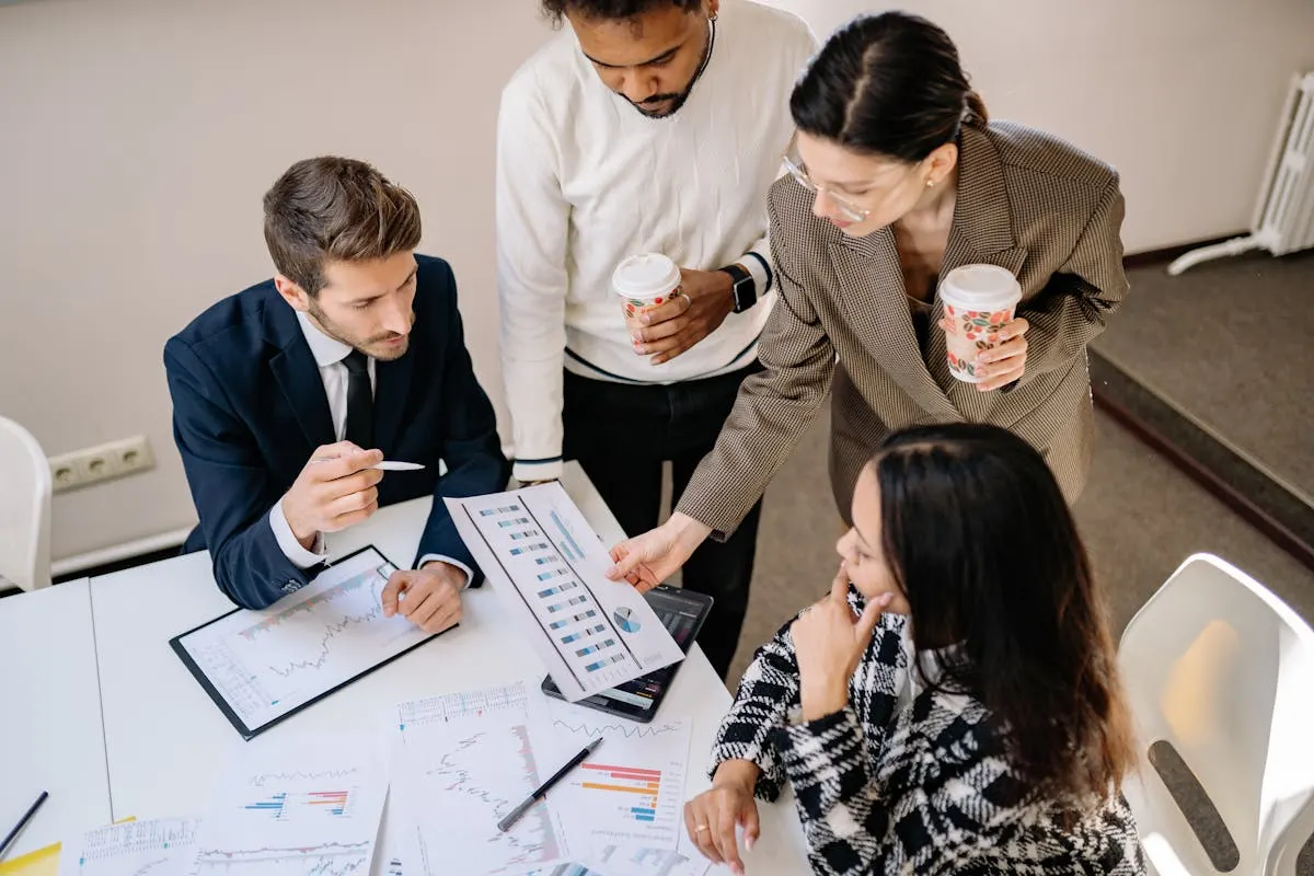 Businesspeople Looking at a Business Graph